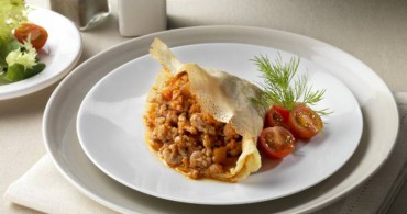 Crepes rellenas a la boloñesa