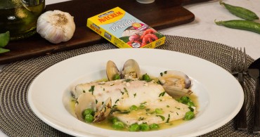 Emplatado con producto lubina en salsa verde