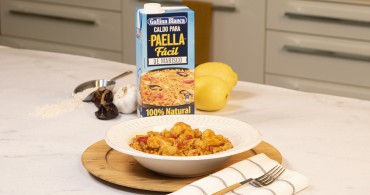 Emplatado con producto arroz meloso de pescado