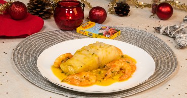 Emplatado con producto merluza en salsa de langostinos