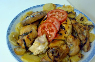 pollo entero troceado al horno con patatas